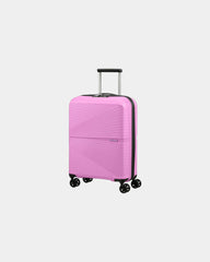 Lekka walizka 4-kołowa American Tourister Airconic 67 cm z nadrukiem - Różowy