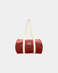 Torba duffel z bawełny organicznej Hindbag Sam z nadrukiem - Ceglastoczerwony